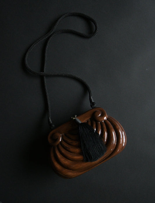 wooden sculptural tassel purse