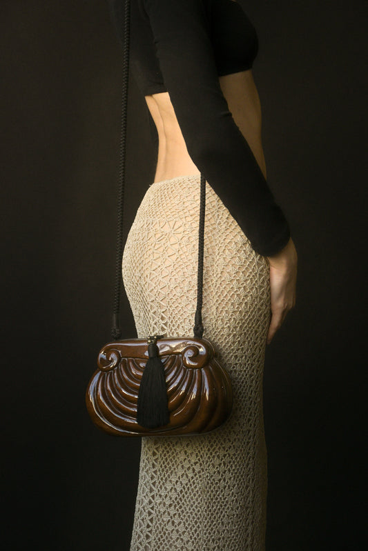 wooden sculptural tassel purse