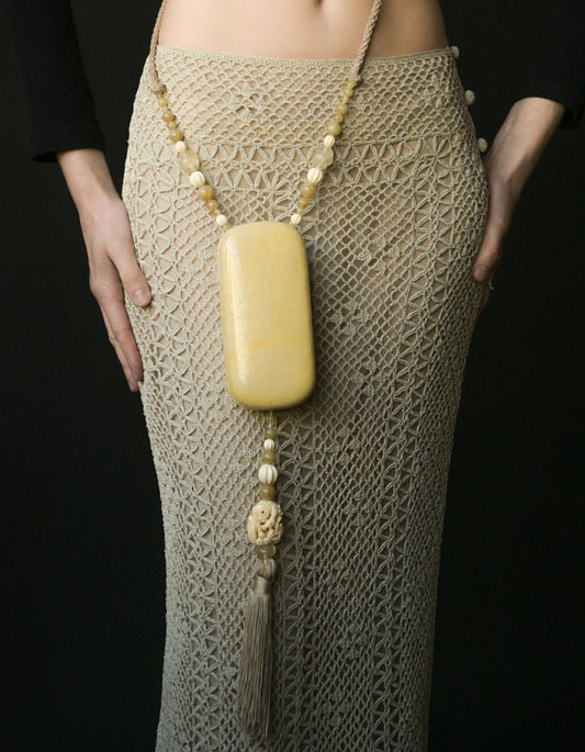 carved bird tassel beaded minaudière purse