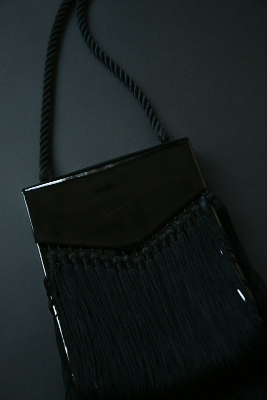 yves saint laurent black patent leather fringe purse
