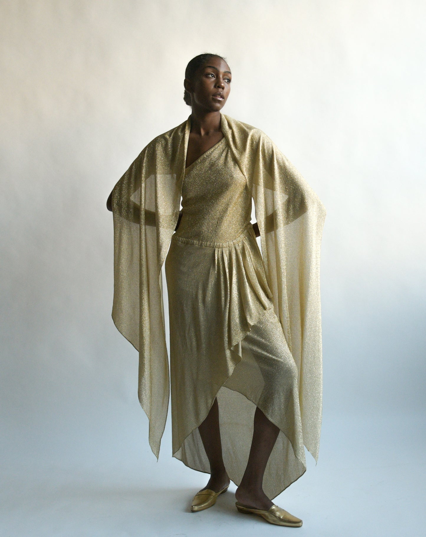 1970s halston lamé one shoulder dress