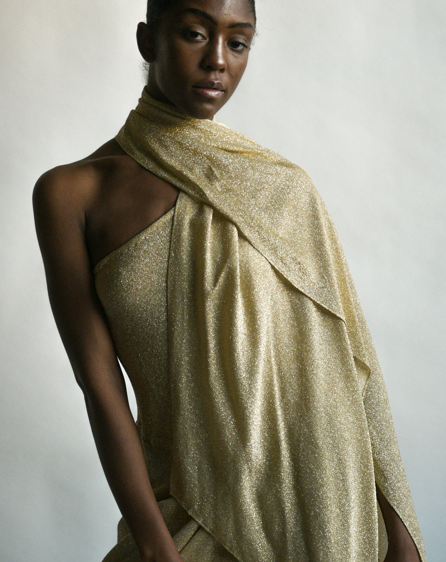 1970s halston lamé one shoulder dress