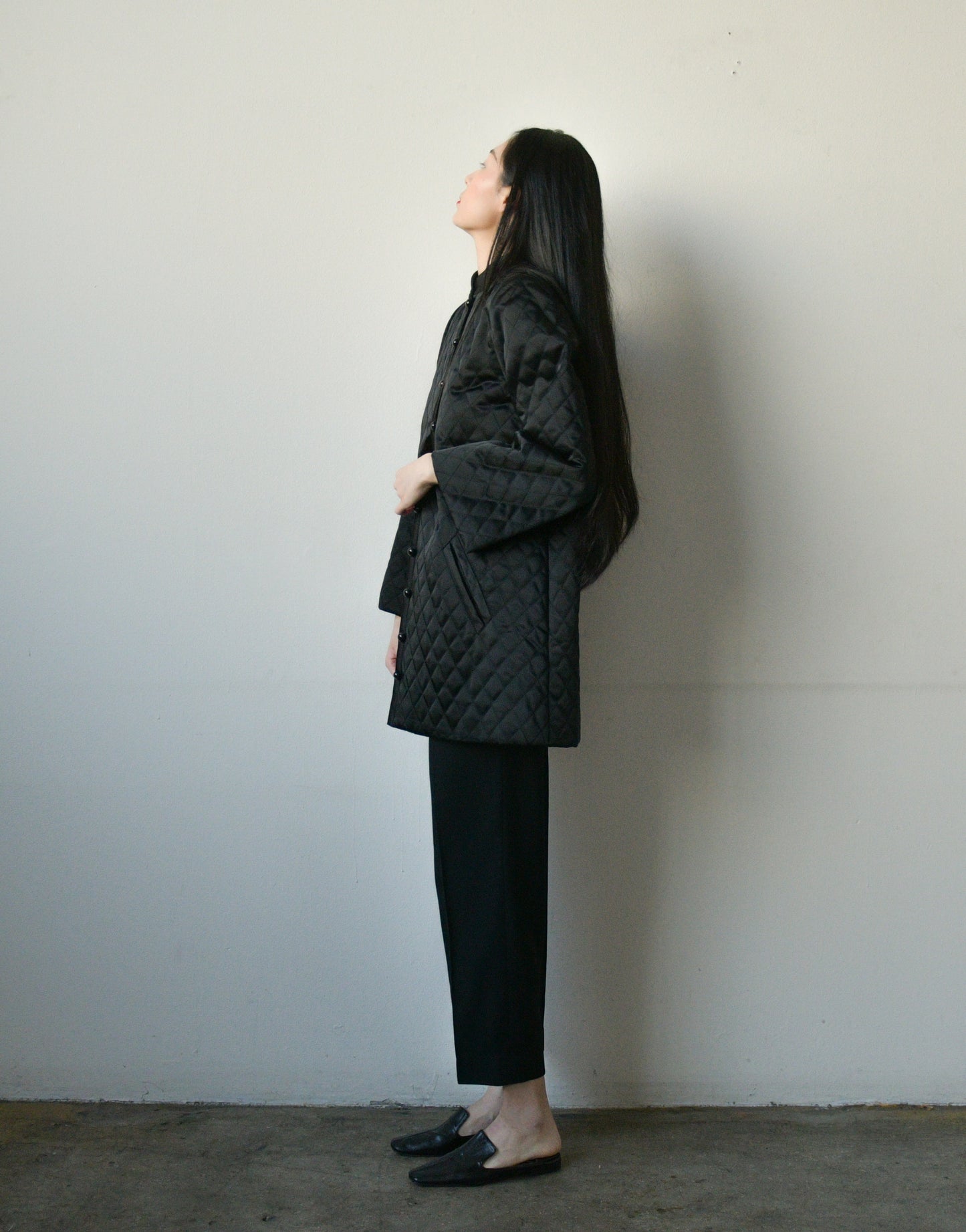 fw 1975 yves saint laurent black quilted coat