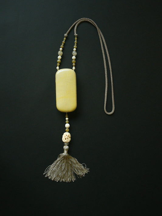 carved bird tassel beaded minaudière purse