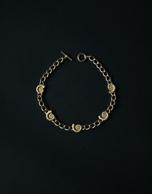 gold coiled seashell chain collar necklace