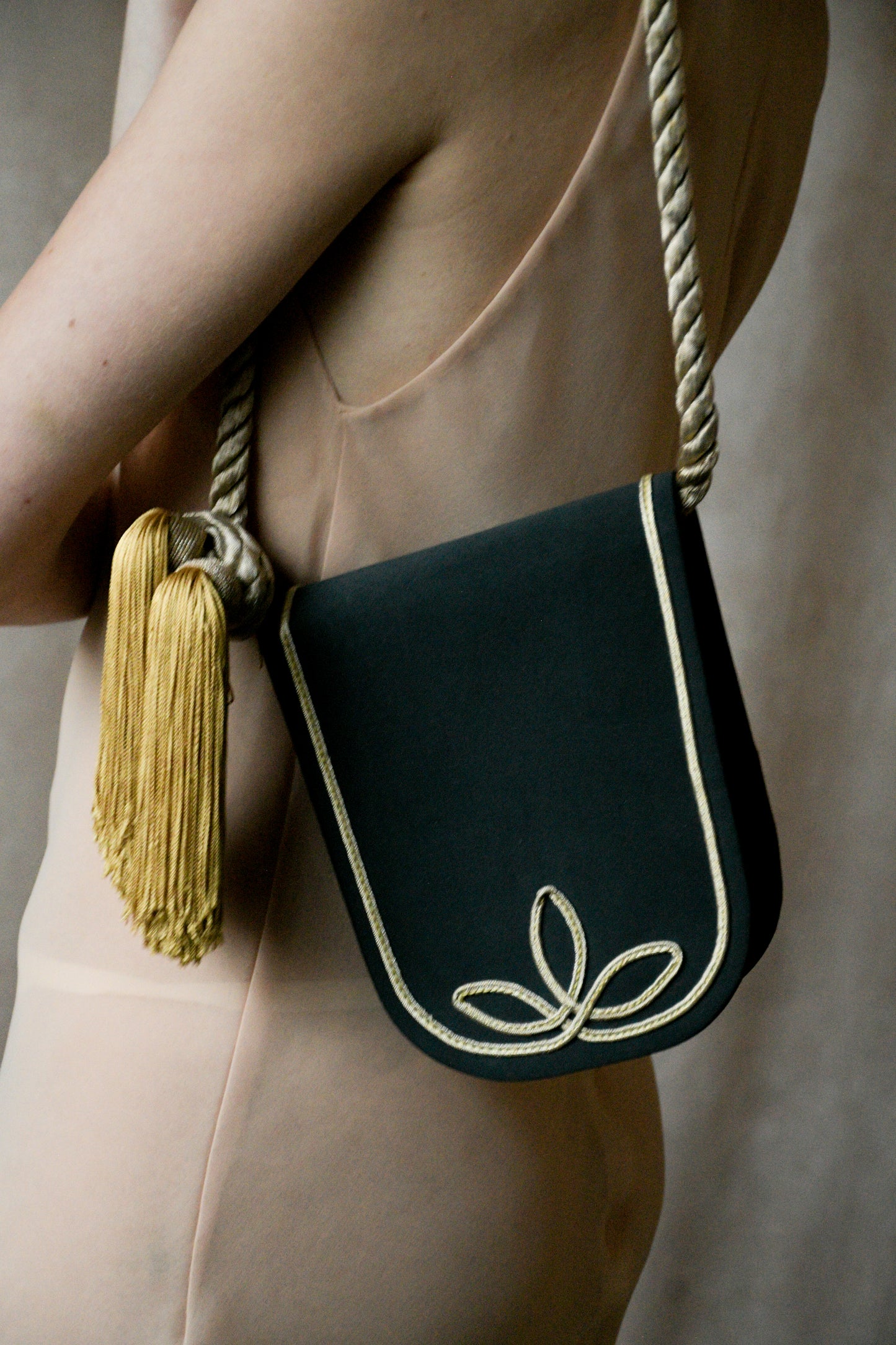 guy laroche black rope and tassel purse
