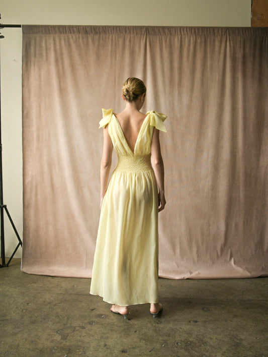 christian dior 1960s deadstock yellow smocked dress