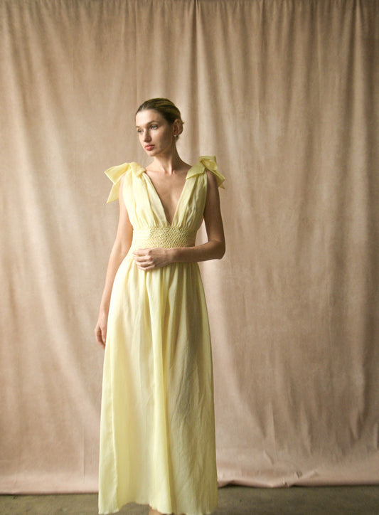 christian dior 1960s deadstock yellow smocked dress