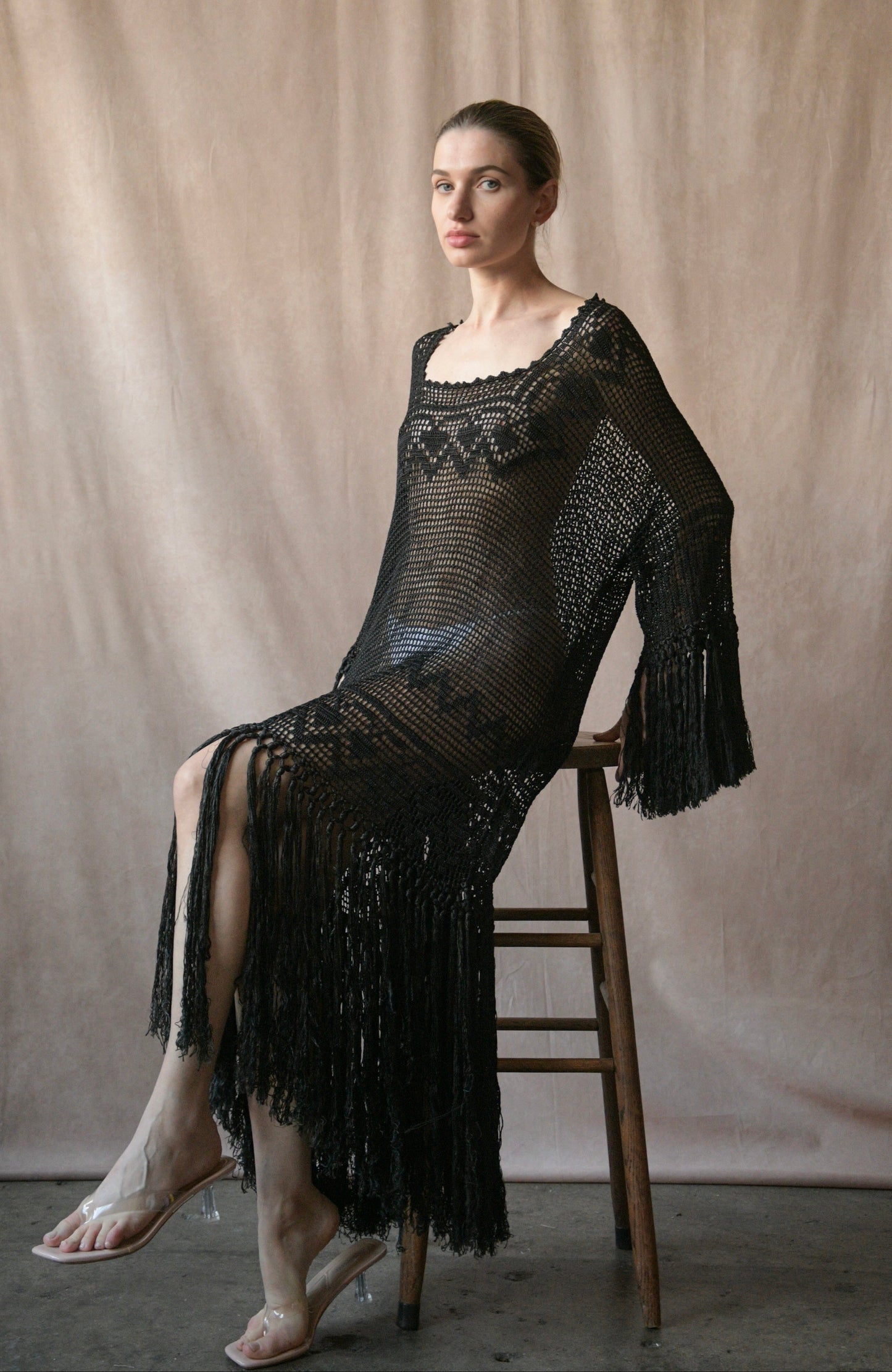 stylist hold - antique 1920s black crochet lace fringe dress