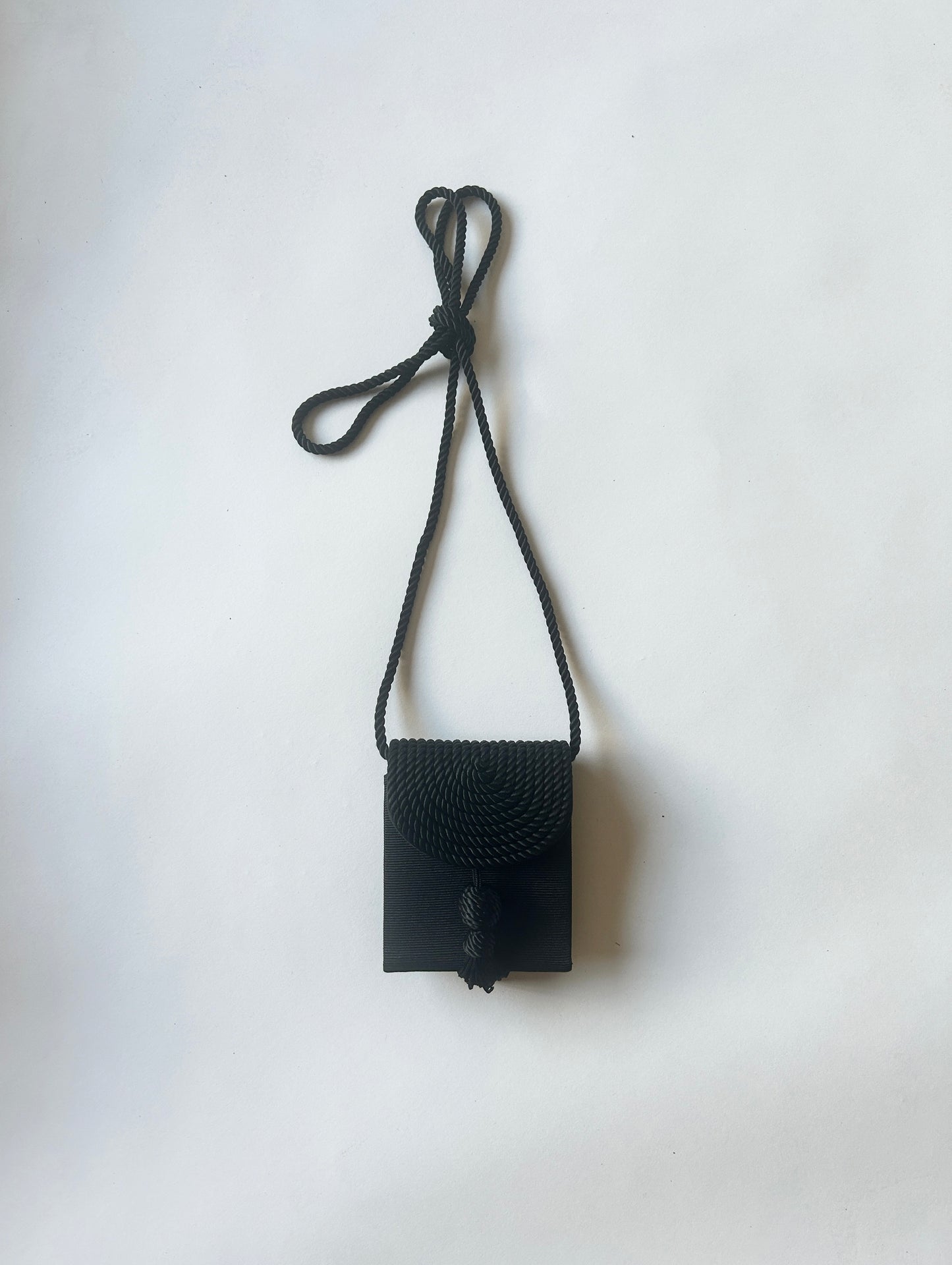 black rope tassel mini purse